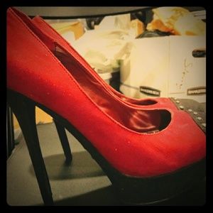 Stilletto red with black and studded heels